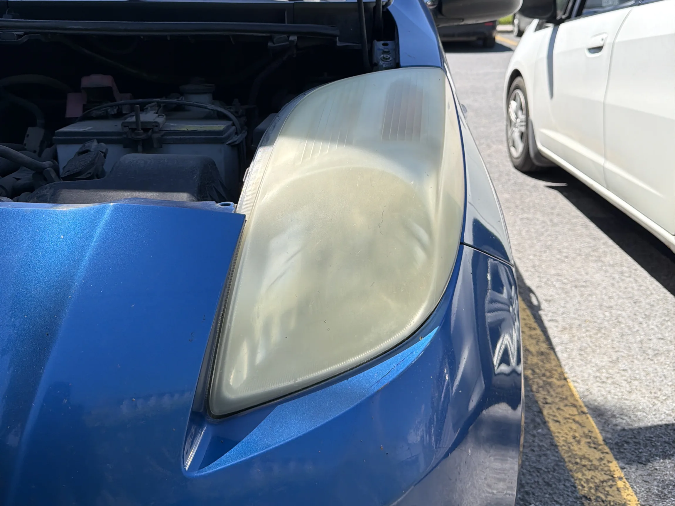 Yellowed, cloudy headlight before restoration