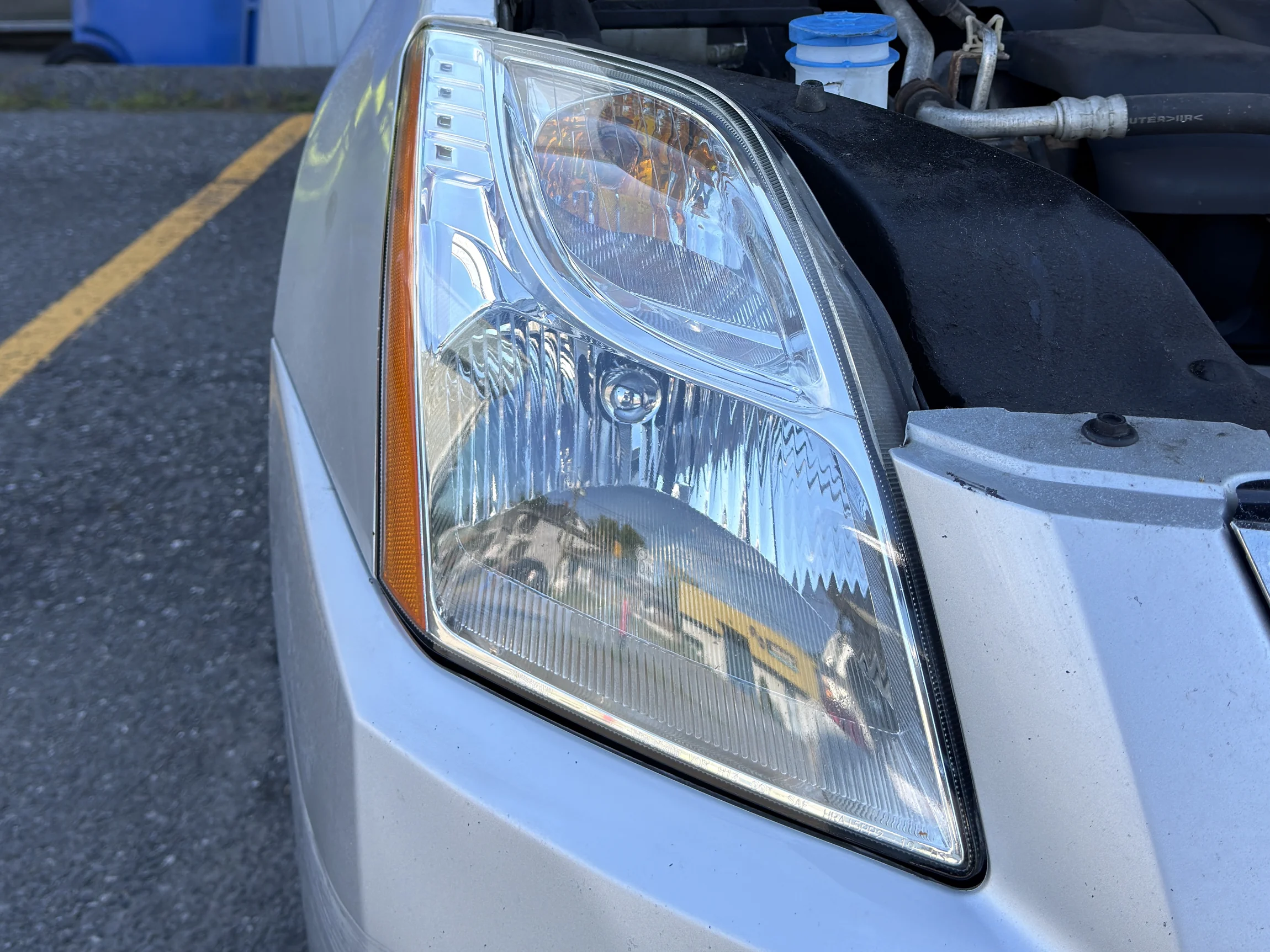 Nissan Sentra headlight after restoration — clear and bright