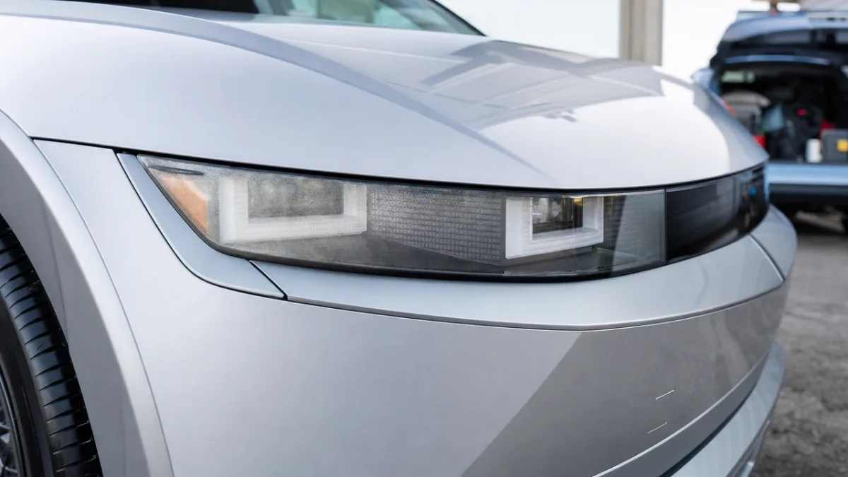 Front LED headlights of the Hyundai Ioniq 5 with slight clouding visible on the polycarbonate lens